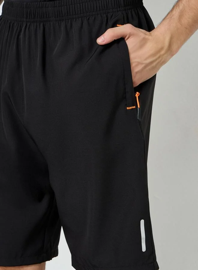 Styli Active  Men Reflector Print Training Shorts with Zipper Pocket for Men | Best Price UAE