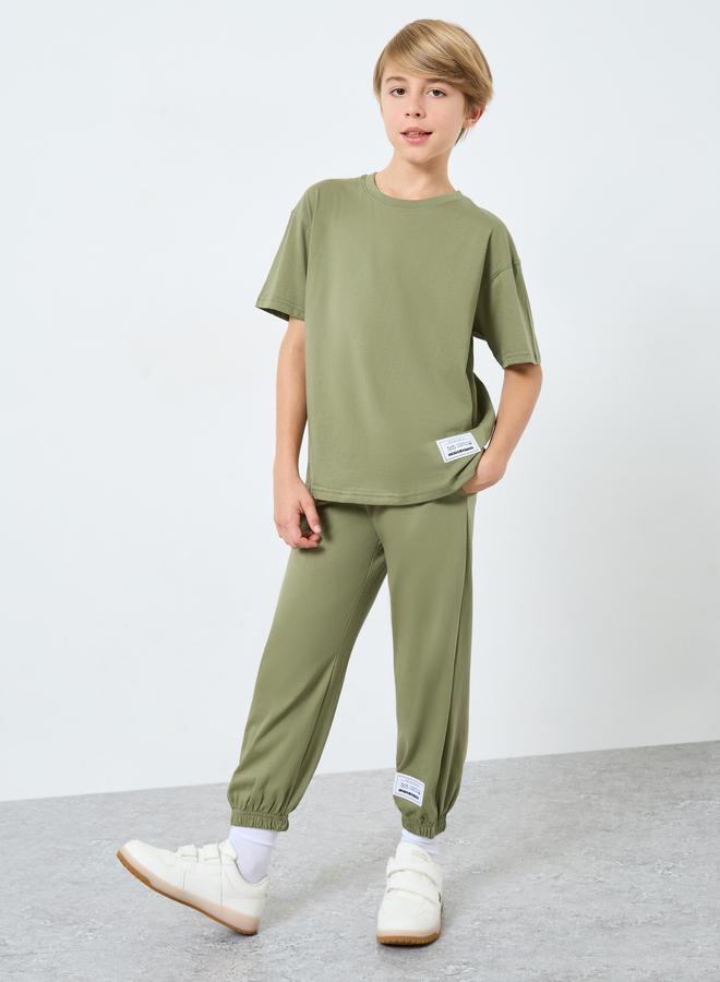 Styli Teens Green T-Shirt and Badge Detail Joggers Set - Image 1
