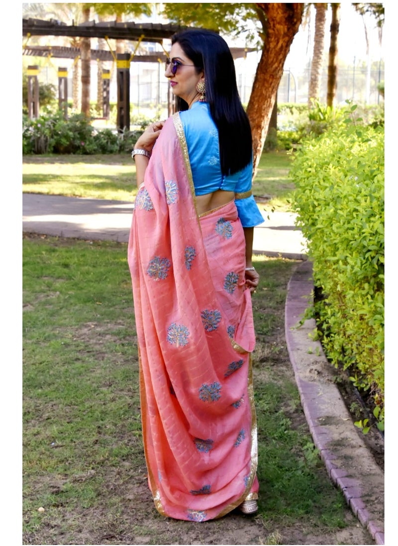 Grab Mantra - Light Orange Color Chinon Silk Saree with Turquoise Blue Flower Embroidery All Over And Satin BlueUnstitched Blouse - Image 1