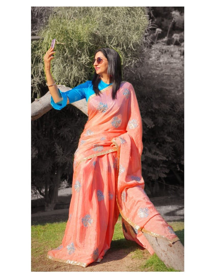 Grab Mantra - Light Orange Color Chinon Silk Saree with Turquoise Blue Flower Embroidery All Over And Satin BlueUnstitched Blouse - Image 1