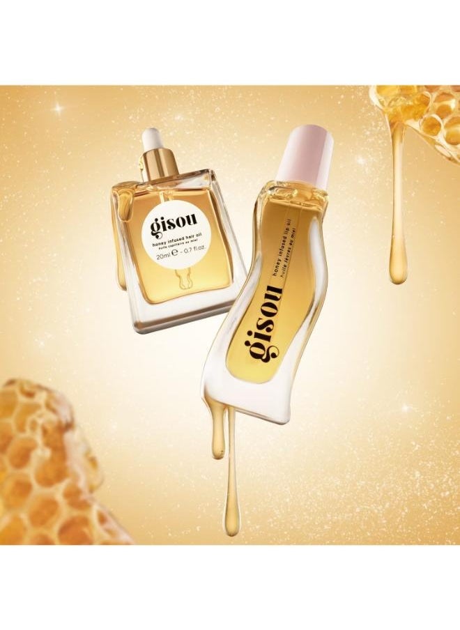 Gisou A duo of honey hair oil and lip oils  - Image 1