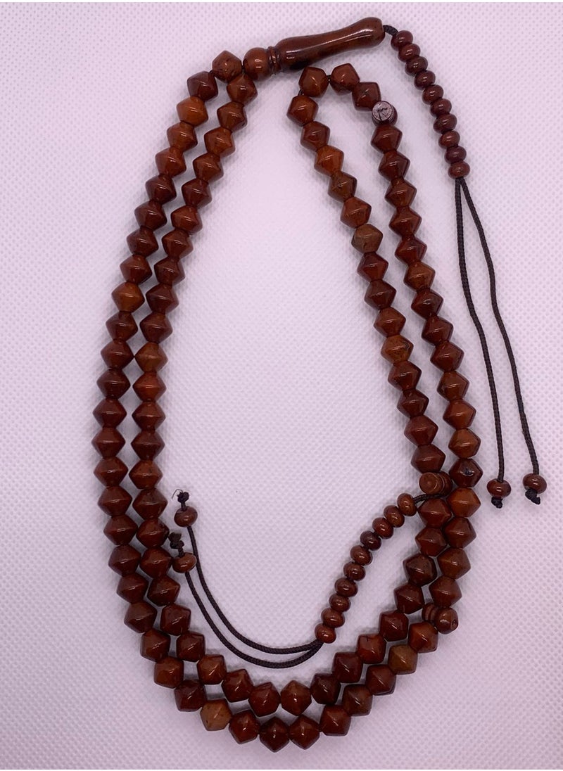 ماركة غير محددة - سبحة كوك بعداد طبيعي وطراز جميل  سبحة من خشب الكوك 99 خرزة وبها عداد طبيعي طراز جميل  وتعتبر سبح الكوك نوع من السبحات المصنوعة من خشب شجرة الكوك، وهو خشب يتميز بجماله وملمسه الدافئ. تُستخدم السبحات عادة في الذكر والتسبيح، وتعتبر سبحة خشب الكوك تحفة فنية بطرازها المتعدد الرائع ولونها الغني. - Image 1