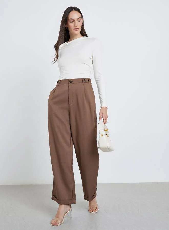 ستايلي Styli Brown Tapered Fit Pants with Buttons
