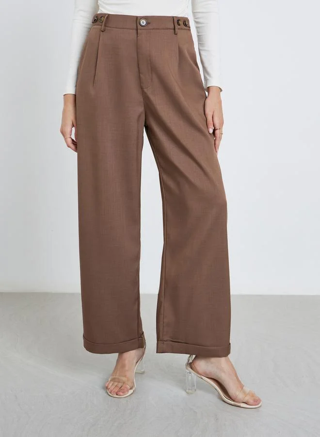 ستايلي Styli Brown Tapered Fit Pants with Buttons