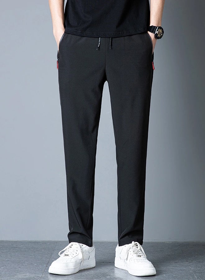 DR Men's Black Slim-Fit Sport Pants with Red Zipper Accents - Image 1