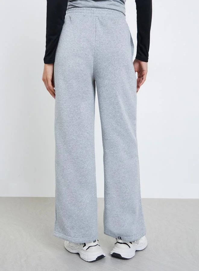 Styli Women Grey Solid Drawstring Waist Wide Leg Joggers