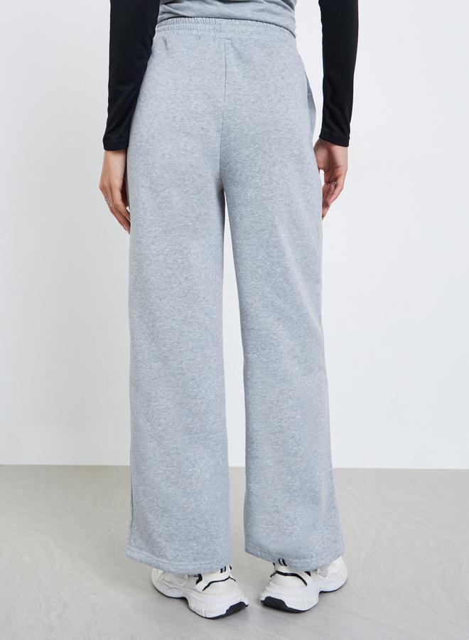 Styli Women Grey Solid Drawstring Waist Wide Leg Joggers - Image 4