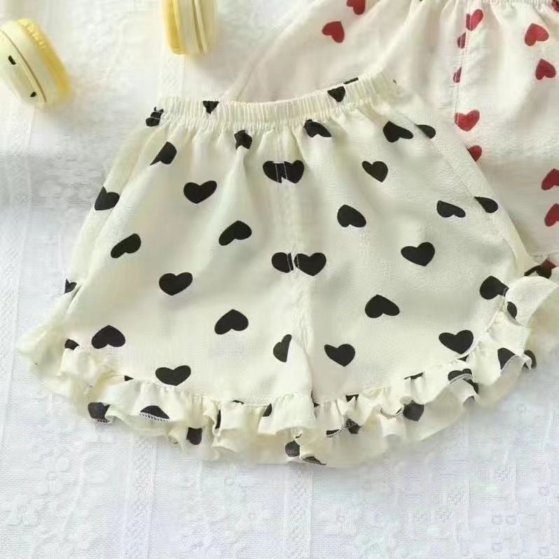 شورت صيفي أنيق ومتعدد الاستخدامات للفتيات الصغيرات - ملابس خارجية بحافة دانتيل رفيعة - شورت بناتي برسوم كرتونية