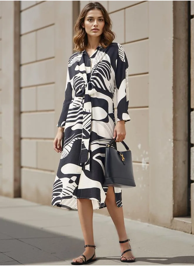 ايكونيك Iconic All-Over Print Shirt Dress with Knot Detail