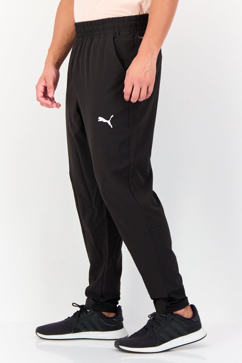 PUMA سروال رياضي للرجال بتصميم ملائم بشعار العلامة التجارية، أسود - Image 2