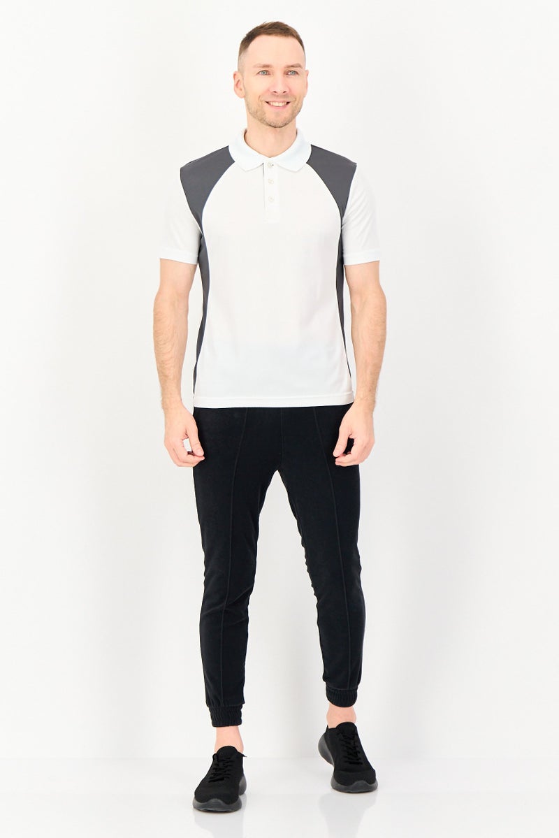 PUMA تي شيرت بولو رياضي للرجال بأكمام قصيرة مع شعار مطرز، متعدد الألوان - Image 2