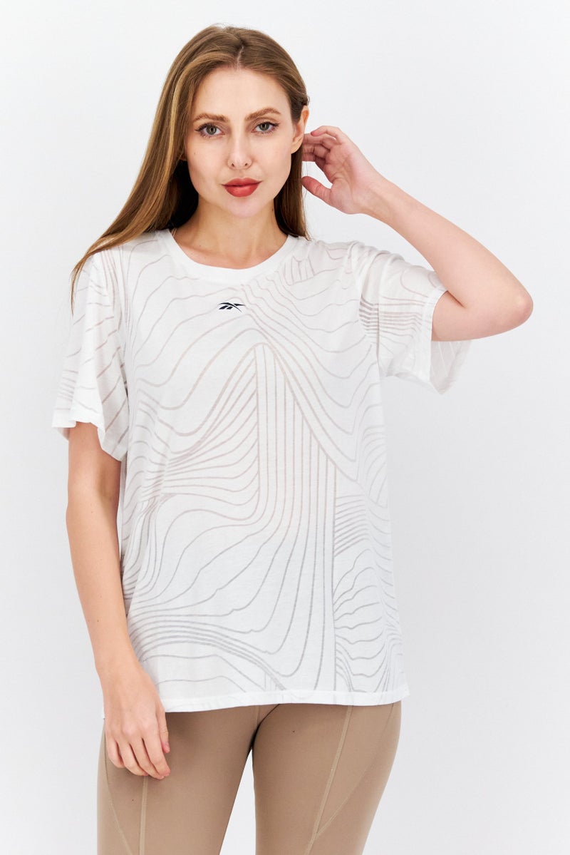 Reebok تي شيرت رياضي نسائي بأكمام قصيرة، أبيض - Image 1