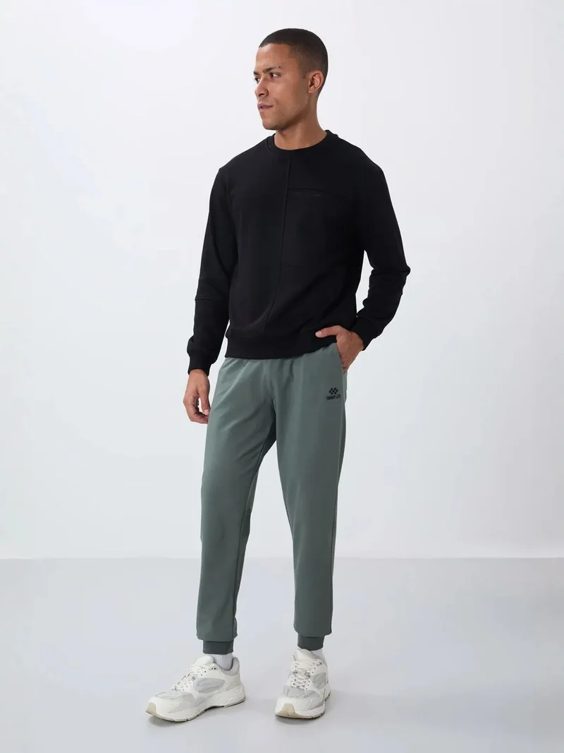 تومي لايف TOMMY Men's Solid Fleece Sweatpants