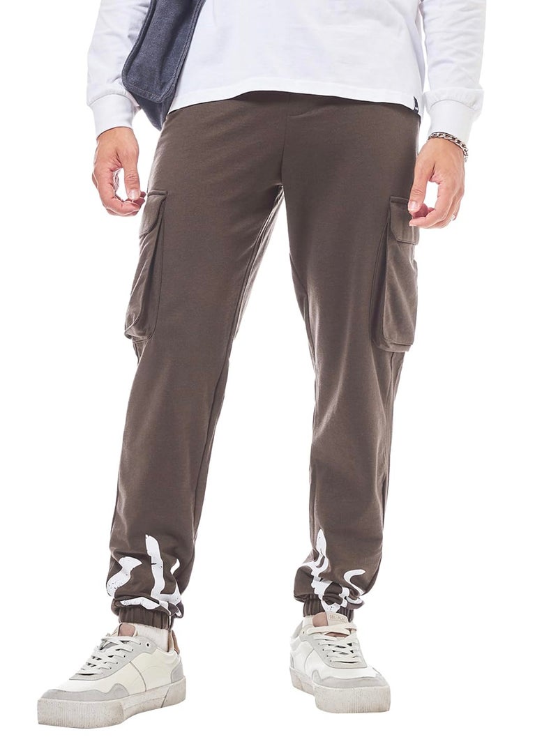 Bewakoof Men's Typography Oversized Fit Cotton Blend Cargo Joggers_584147_Brown_L - Image 1