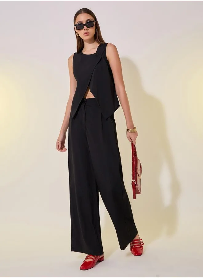 ستايلي Solid Asymmetric Hem Vest Top and Pants Co-Ords