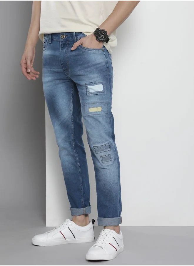 شركة المرآب الهندية Men Regular Fit Solid Mid-Rise Stretchable Jeans