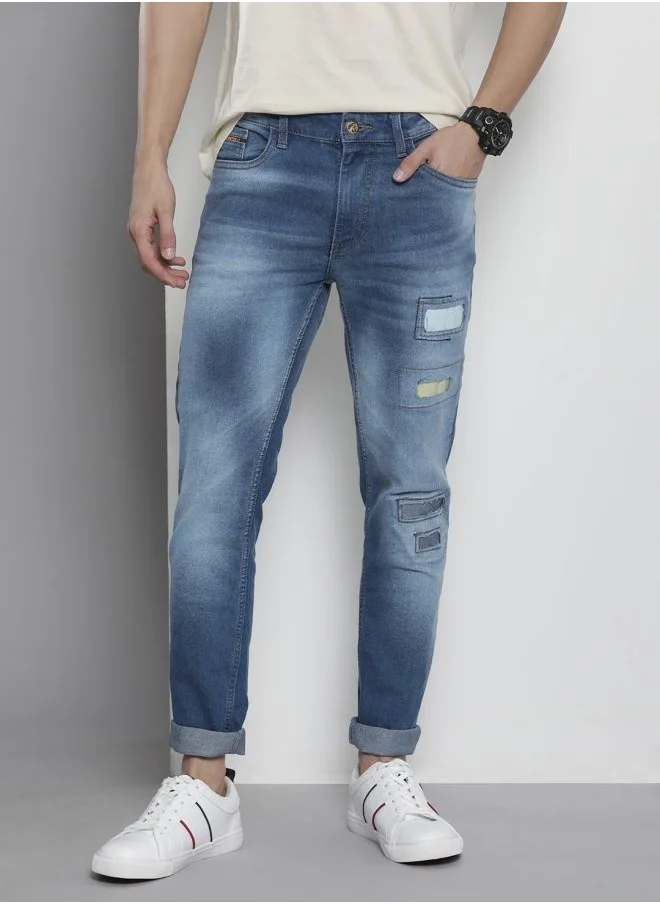 شركة المرآب الهندية Men Regular Fit Solid Mid-Rise Stretchable Jeans