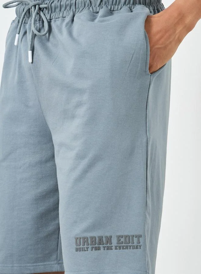 Styli  Men Blue Placement Printed Oversized Shorts for Men | Best Price UAE