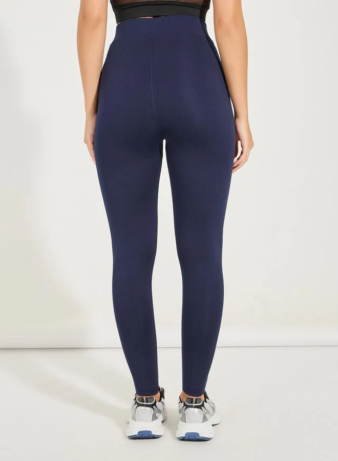 ستايلي اكتيف ليقنز بخصر عريض وطبعة شعار