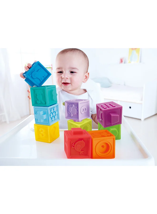 Hape Hape Squeeze Me Blocks, Soft Silicone Stacking Toy, Baby Montessori Sensory Ball Teether, Squeeze Play with Numbers Shapes Animals Fruit and Textures, Activity Toy for Toddlers 6 Months and Up, 10pcs