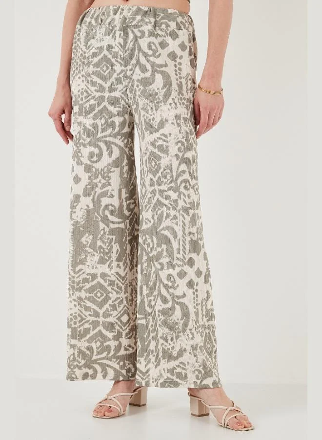 ليلا بنطلون نسائي واسع الساق بخصر عالٍ وقصة قياسية بنقش ليلا