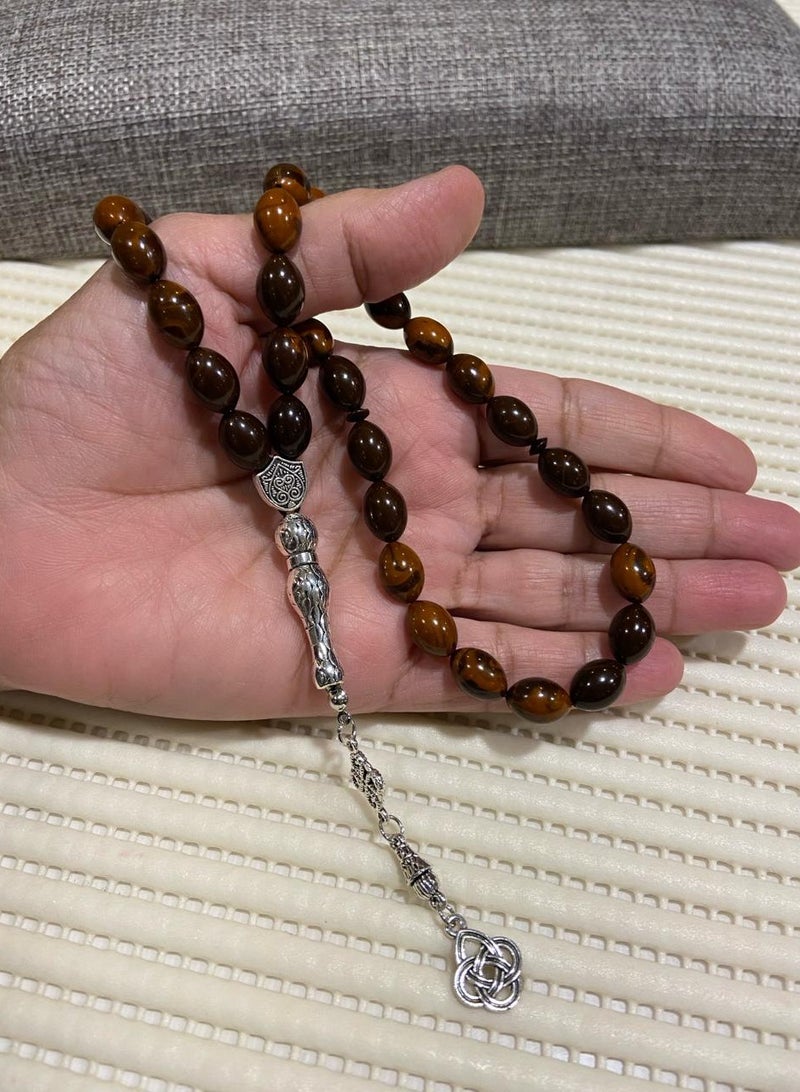 سبحة رجالية من حجر الفاتوران مكونة من ثلاثة وثلاثين خرزة بمقاس ثمانية ونصف ميلليمتر في اثني عشر ميلليمتر - Image 1