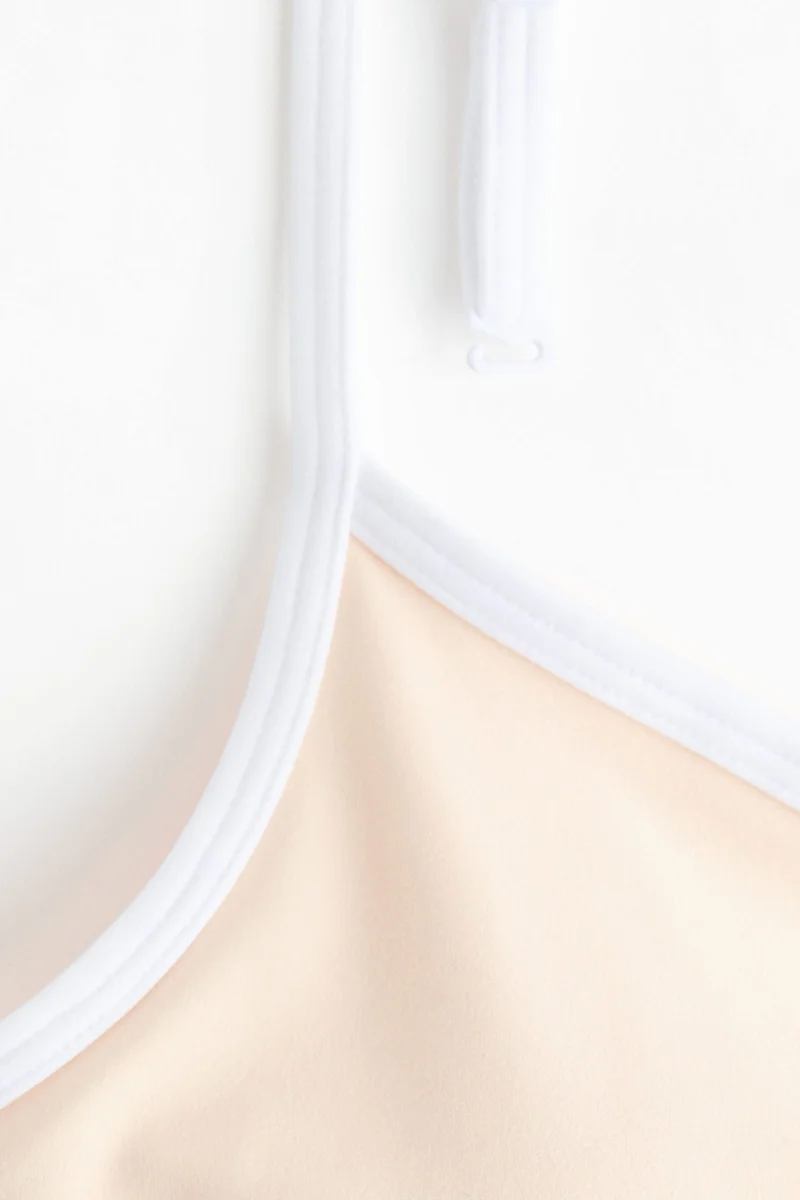 H&M  Medium Support Sports bra with SoftMove™ for Women | Best Price UAE