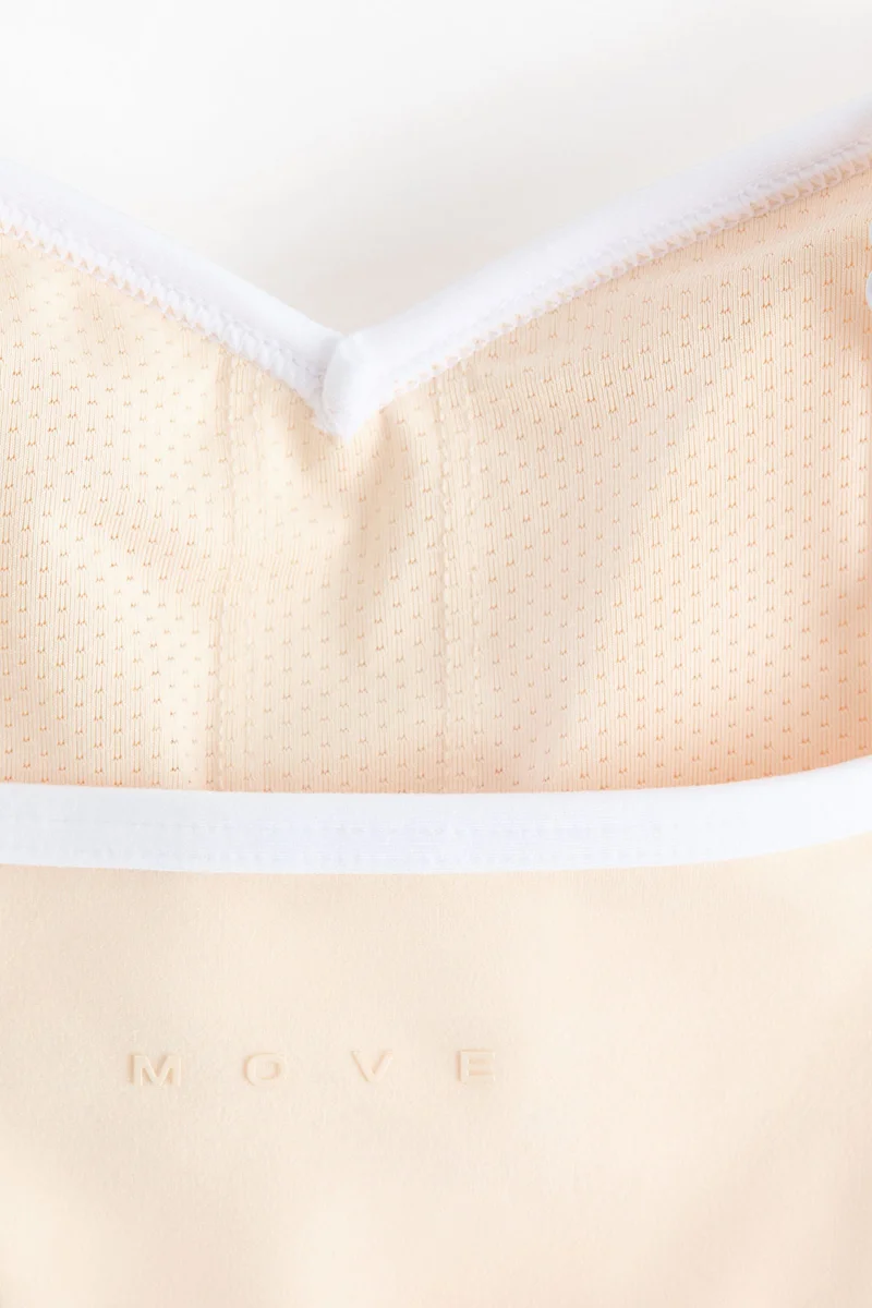 H&M  Medium Support Sports bra with SoftMove™ for Women | Best Price UAE