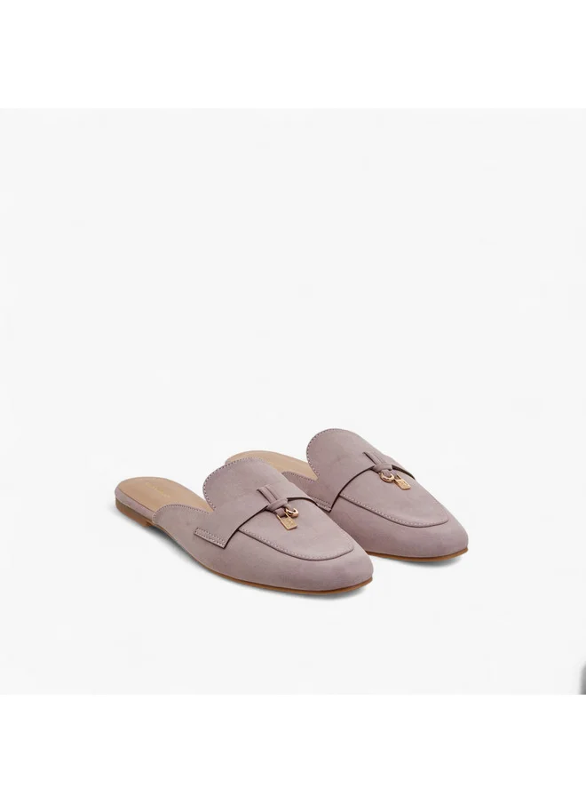 فلورا بيلا من شو إكسبرس Women Solid Slip-On Mules with Metal Accent