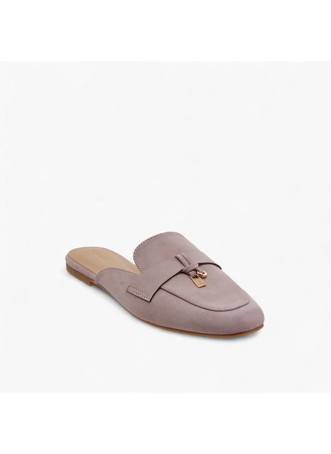 فلورا بيلا من شو إكسبرس Women Solid Slip-On Mules with Metal Accent