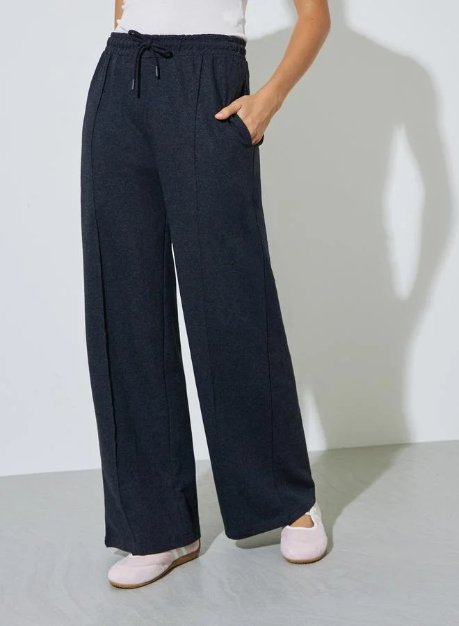 ستايلي Charcoal Solid Wide Leg Joggers with Drawstring Waistband