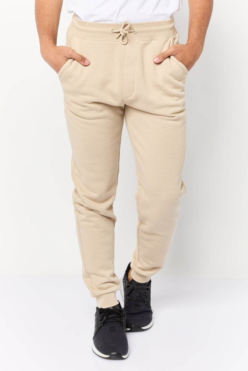 Celio Men Regular Fit Solid Jogger Pants, Taupe - Image 1