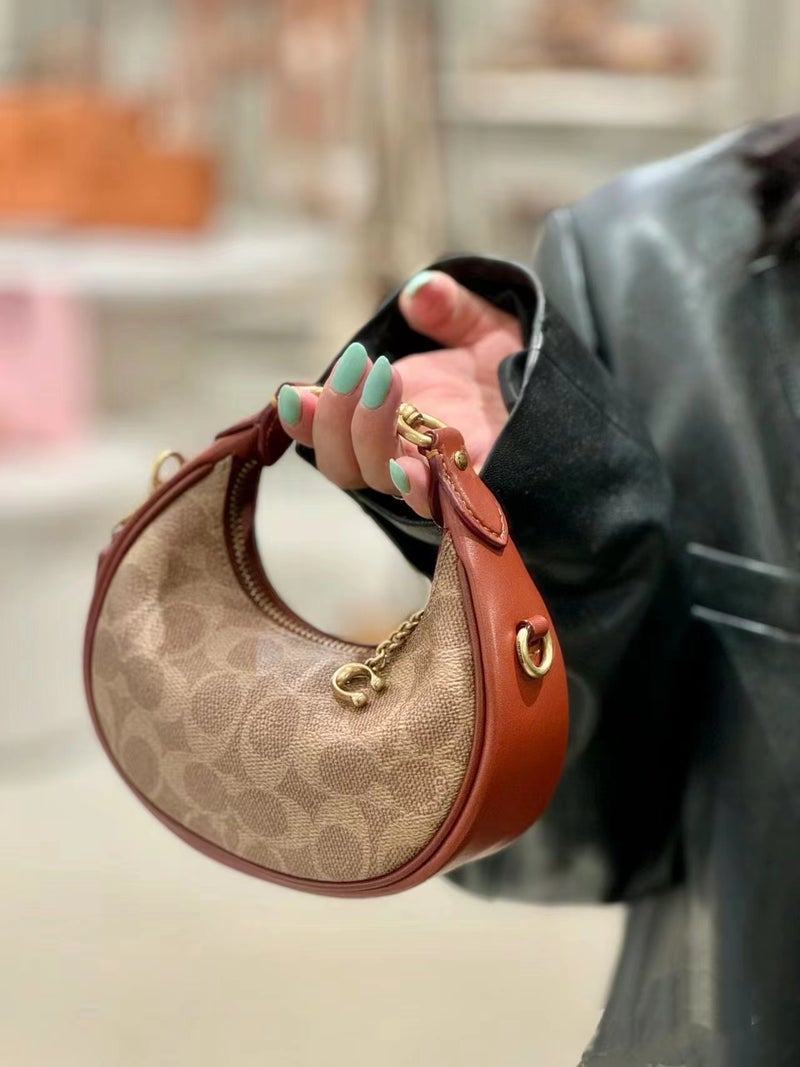 2024 Kous New Jonie Mini Half Moon Bag Portable Shoulder Crossbody Shoulder Leather Womens Bag Small Waste Bag Coffee - Image 1