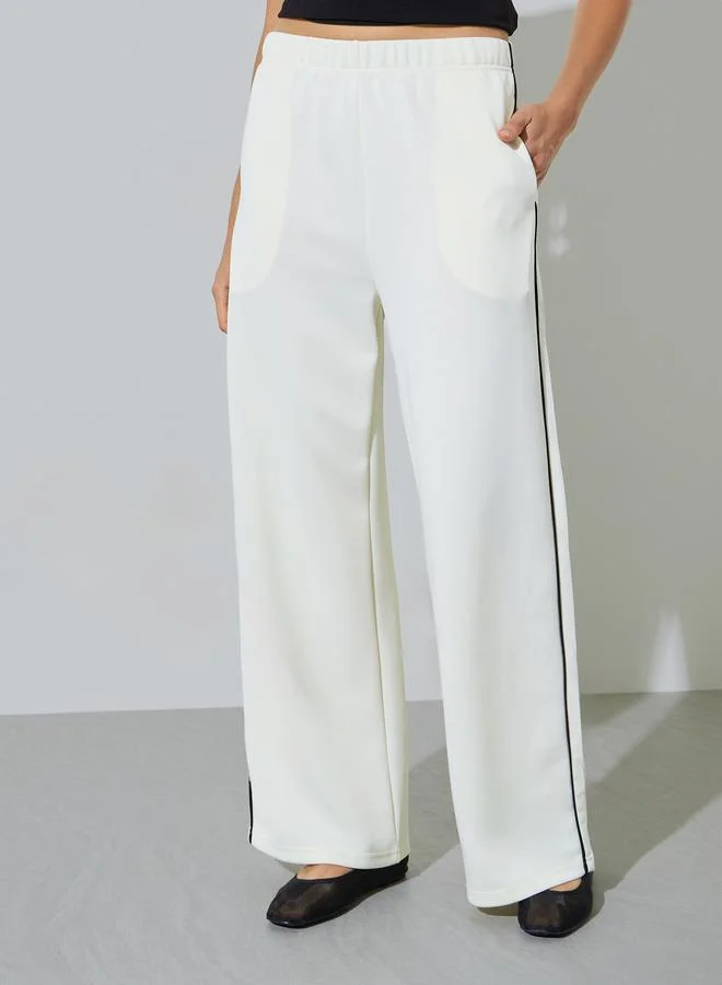 Styli Cream Wide Leg Joggers with Side Seam Piping