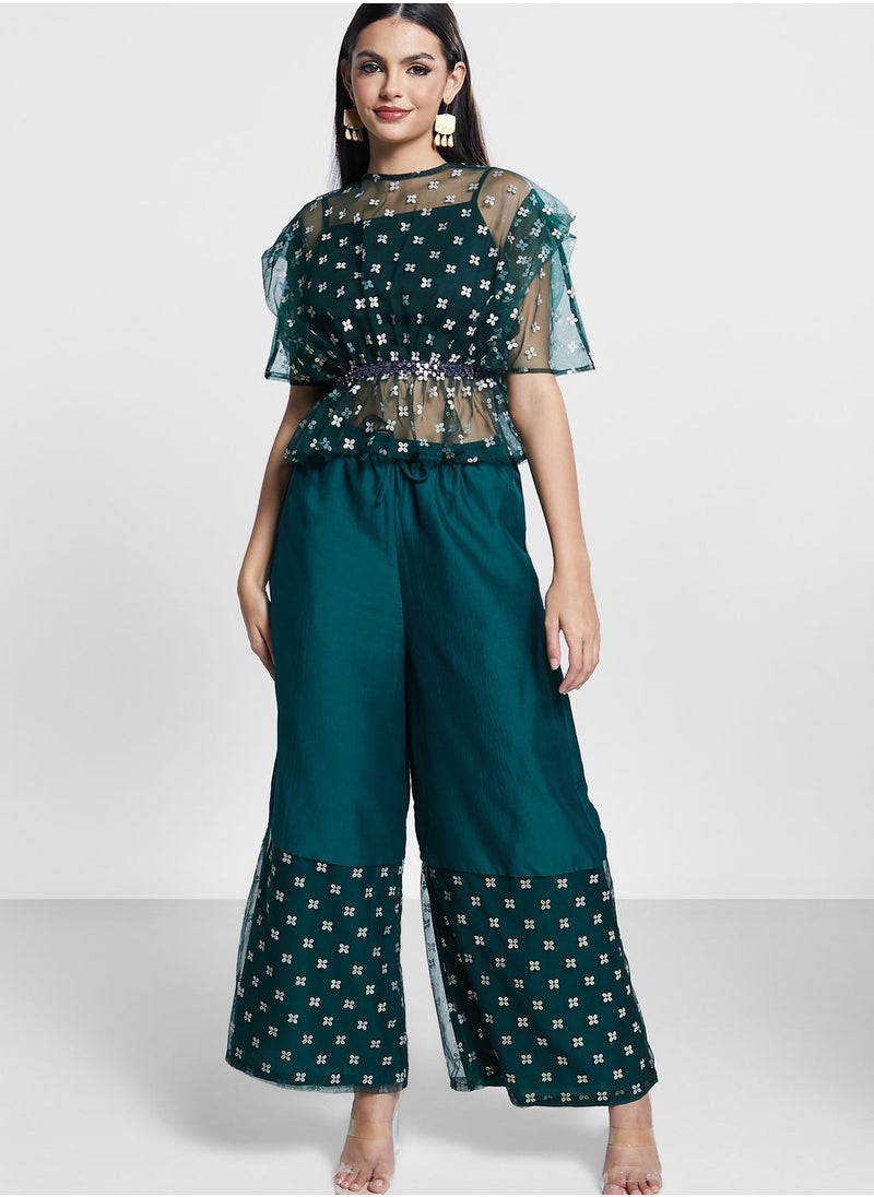 indya - Border Printed Flared Palazzo Pants - Image 1