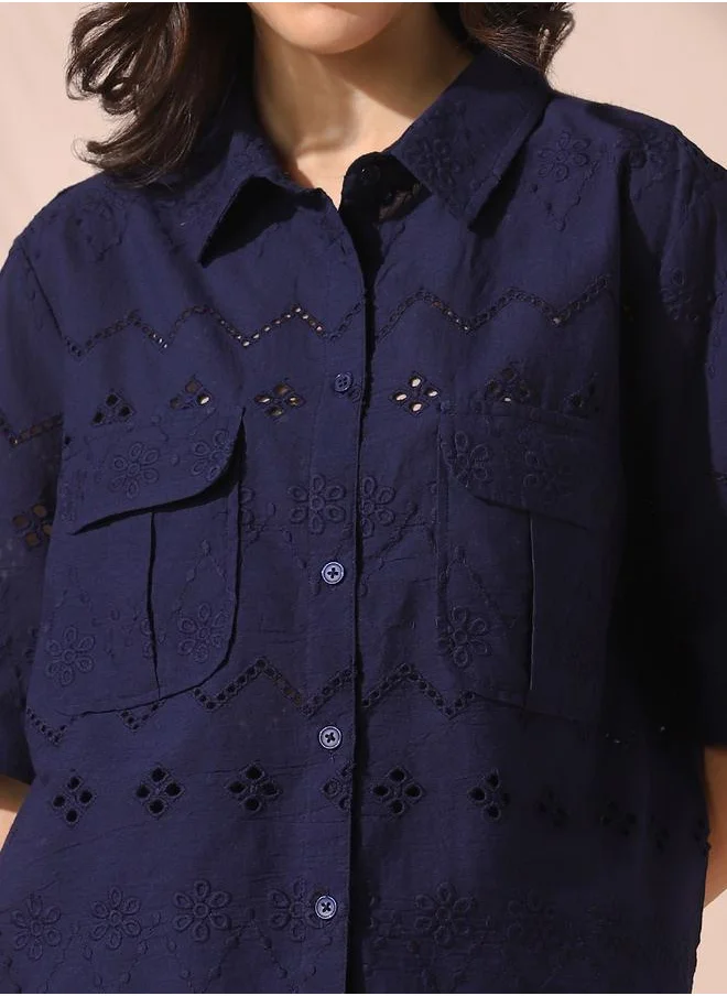 Dennis Lingo Women navy relaxed fit embroidered half sleeves button down cotton blend co-ords set with button closure featuring a spread collar- where comfort meets classic charm.