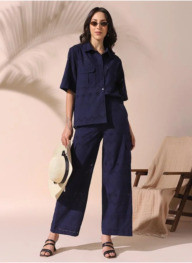 Dennis Lingo Women navy relaxed fit embroidered half sleeves button down cotton blend co-ords set with button closure featuring a spread collar- where comfort meets classic charm.