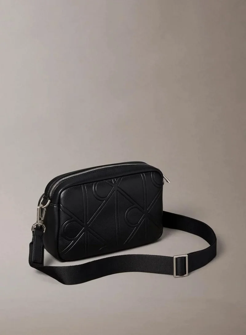 Calvin Klein Black Allover Embossed Emblem Logo Camera Bag for Men | Best Price UAE