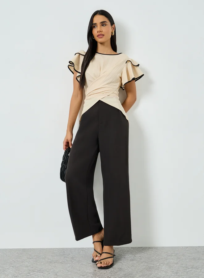 تايك تو بلوزة بنمط لف وأكمام كشكش