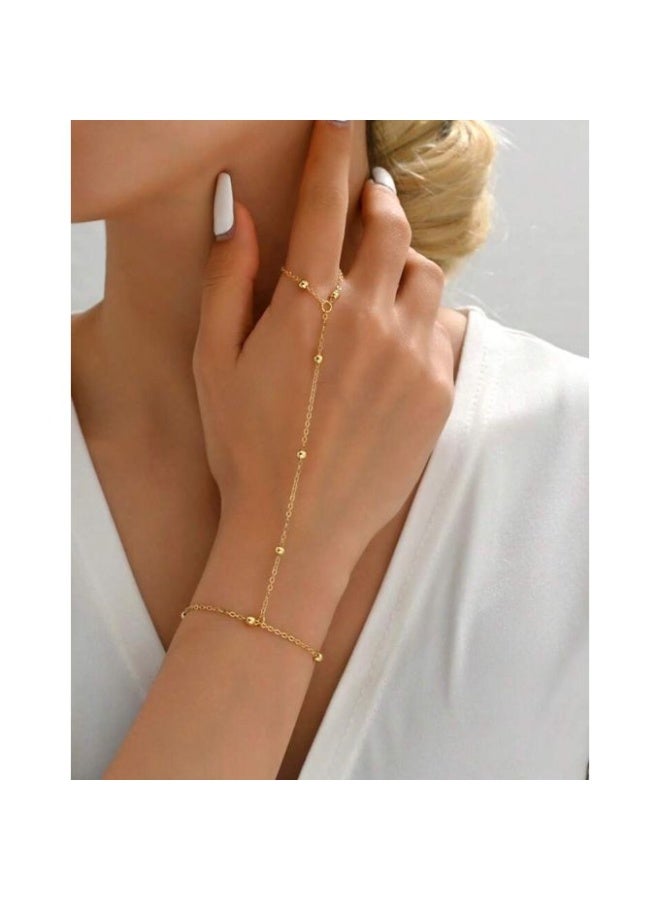 Bracelets A stunning gold-tone hand chain that seamlessly connects a delicate ring to a graceful bracelet - Image 2