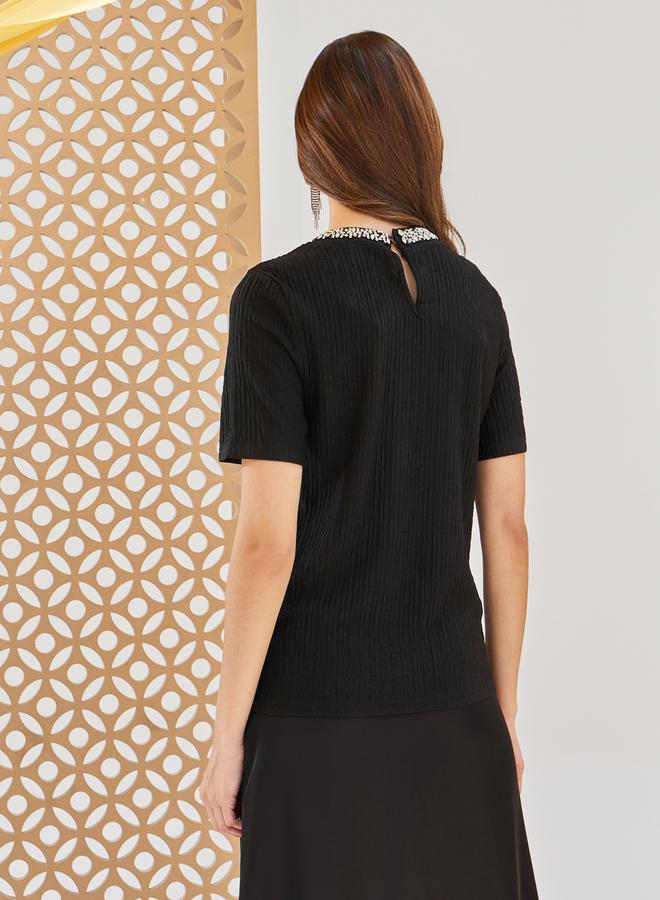 ستايلي بلوزة بأكمام قصيرة وياقة مستديرة مزينة - Image 5