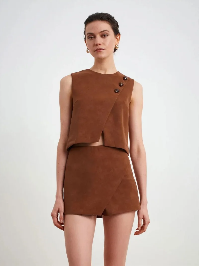 ديلفين Dilvin Mid-Waist Faux Leather A-Line Mini Skirt