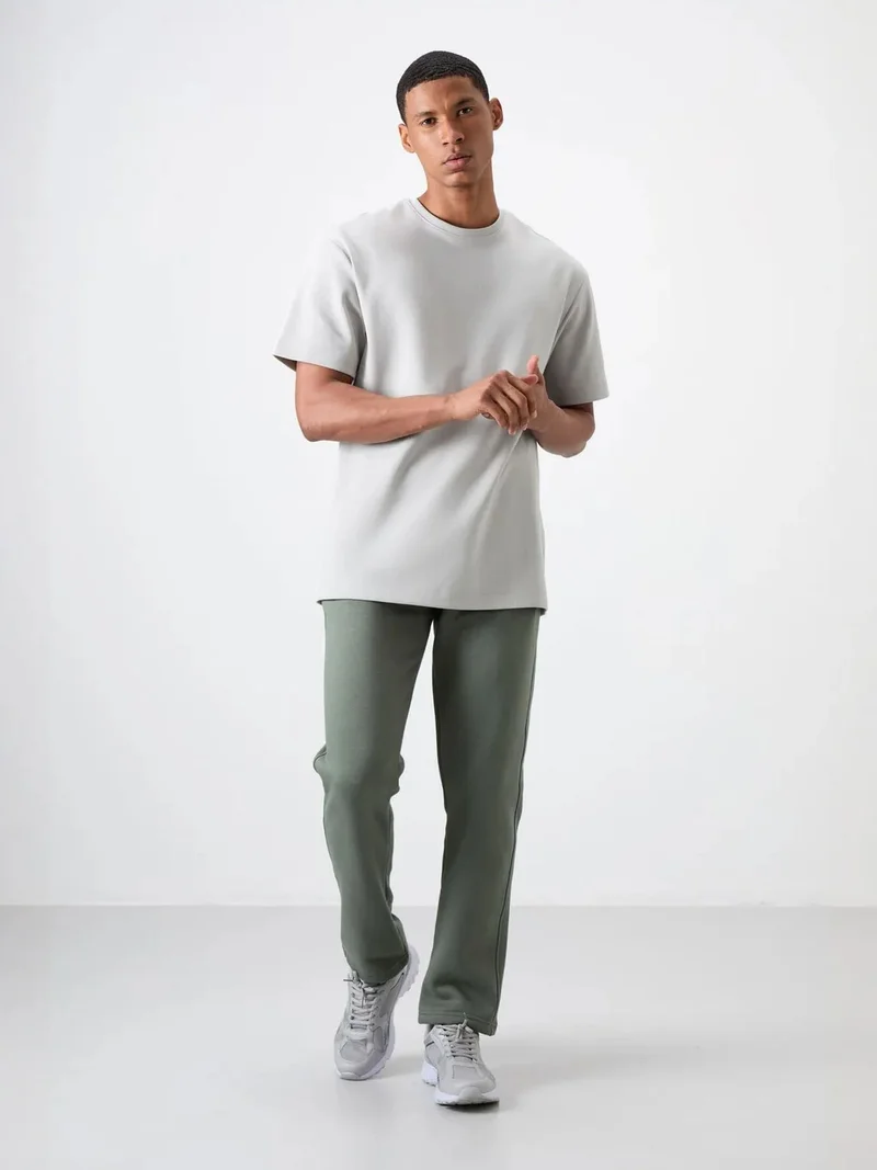 تومي لايف TOMMY Men's Regular Fit Fleece Sweatpants
