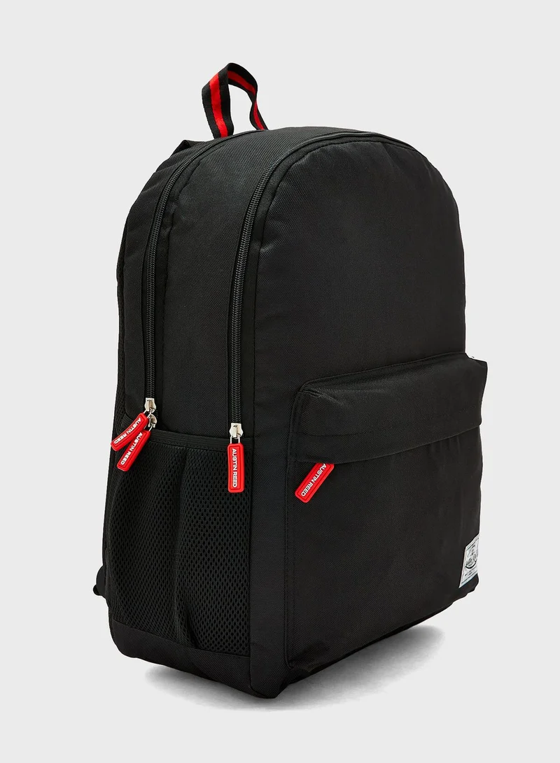 أوستين ريد شنطة ظهر مزينة بشعار الماركة