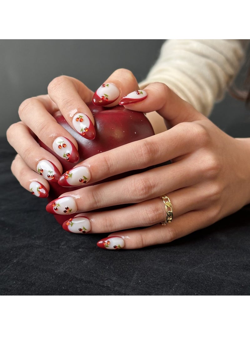 جوسكوين أظافر مضغوطة ، أظافر مزيفة 10 قطع ، أظافر مصنوعة يدويًا بالكامل مع حدود حمراء بأسلوب فرنسي مع طرف لوزي لطيف مزين بالكرز ، أظافر مزيفة مصنوعة يدويًا بشكل رائع وقابلة لإعادة الاستخدام للنساء. - Image 1