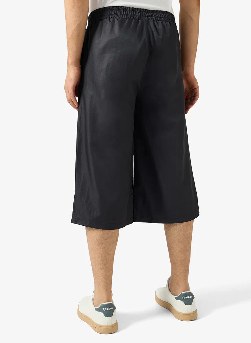 Reebok  Nolan 3/4 Length Pant for Men | Best Price UAE