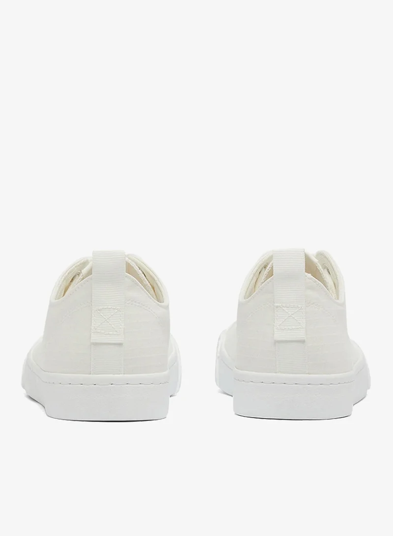 U.S. Polo Assn. White Men's White Low-Top Canvas Sneakers - Iconic Branding for a Clean Look Shoes for Men | Best Price UAE