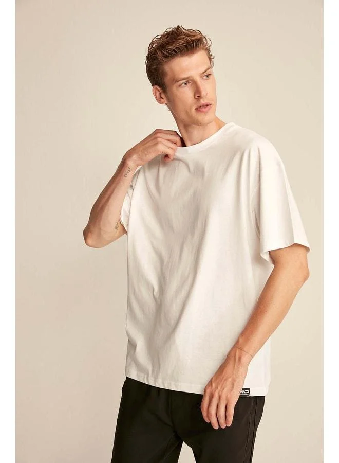 Grimelange Jett Men's Oversize Fit 100% Organic Cotton Thick Textured Bike Neck White T-shirt.