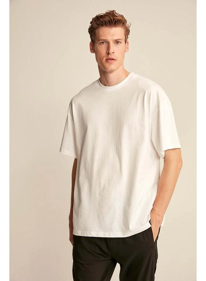 Grimelange Jett Men's Oversize Fit 100% Organic Cotton Thick Textured Bike Neck White T-shirt.