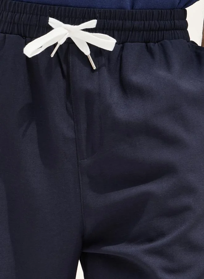 Styli Solid Linen Blend Balloon Fit Trousers with Turn-Up Detail